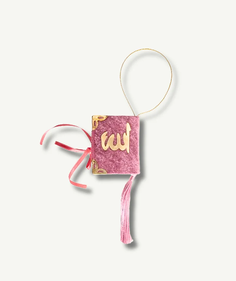Mini Coran rose - le Livre Saint de l'Islam disponible à la Boutique Paradis Oriental, contenant les révélations d'Allah au Prophète Muhammad, des versets et des sourates.